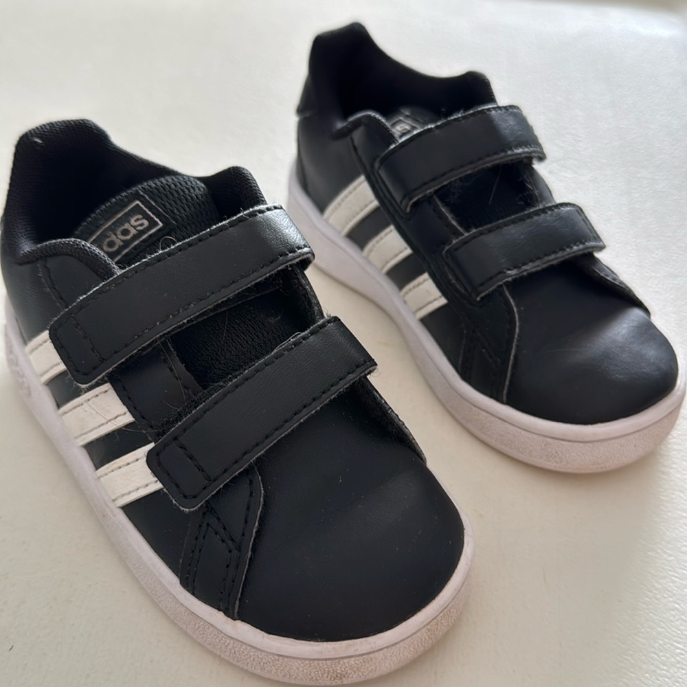 Adidas sneakers size 6 1/2. Lightly worn. 
Non-smoking, pet-friendly home.